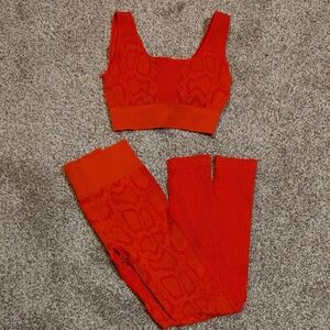 Vibrant Red Textured Activewear Bra And Leggings Set